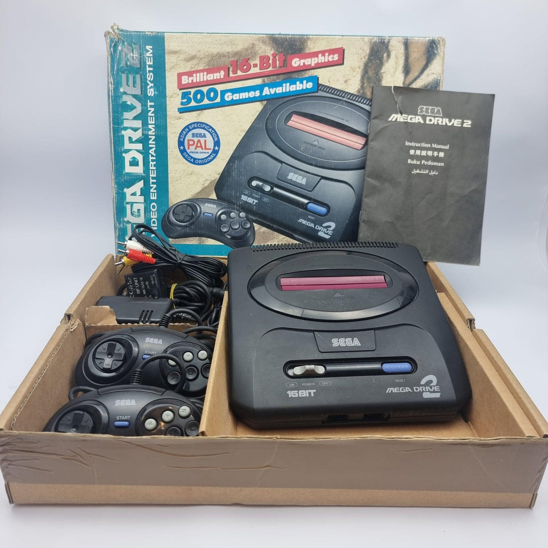 Retro gaming console bundle with games and controllers
