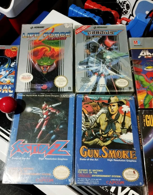 Japanese Famicom shoot ’em up game collection featuring classic 8-bit shooter cartridges for retro video game collectors.