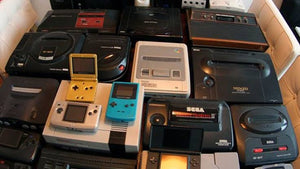Collection of iconic retro video games from Nintendo, PlayStation, SEGA, and Game Boy displayed for collectors.