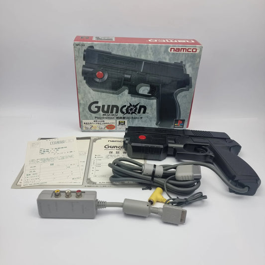 Collection of authentic retro gaming accessories including controllers, memory cards, AV cables, protective cases, and console display stands.
