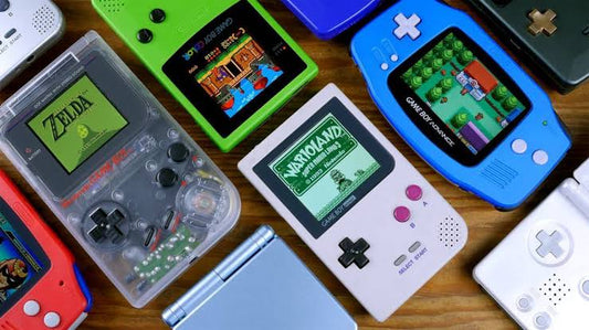 Collection of retro gaming handhelds including Nintendo Game Boy, Game Boy Advance, Nintendo DS, Sony PSP, Sega Game Gear, and Neo Geo Pocket Color.