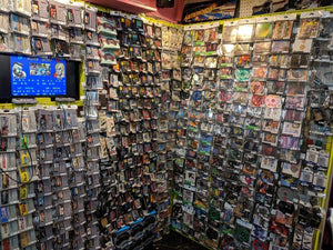 Retro gaming collectibles and console display