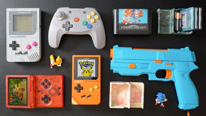 A collection of authentic retro gaming consoles including Nintendo, PlayStation, and SEGA systems, showcasing the perfect starting point for new collectors at Retros.ae.