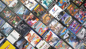 Collectible PS1, PS2 and PS3 video games displayed with original PlayStation cases and physical discs for retro gaming collectors.