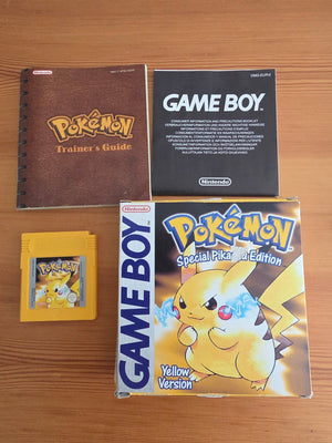 Rare Nintendo Game Boy game cartridges including Pokémon, Kid Dracula, Amazing Tater, and other valuable handheld collectibles.