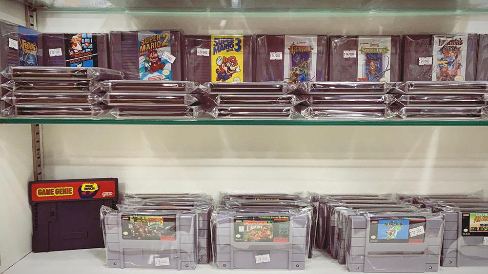 Pre-owned gaming consoles display