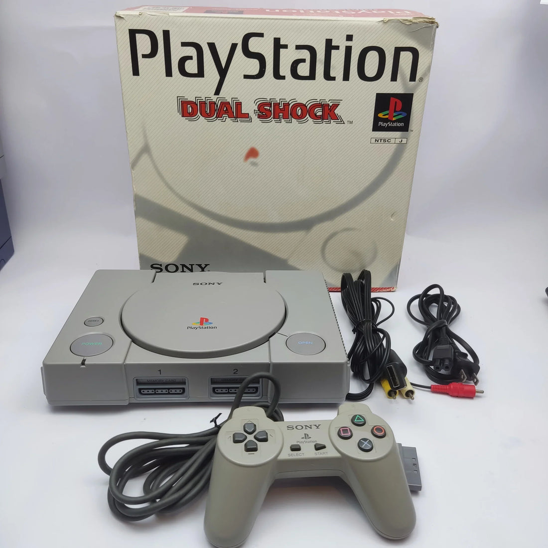 Collection of classic PS1 console games and retro PlayStation products in the UAE