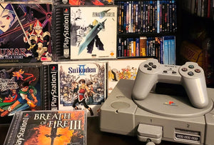 PlayStation 1 console with retro games collection