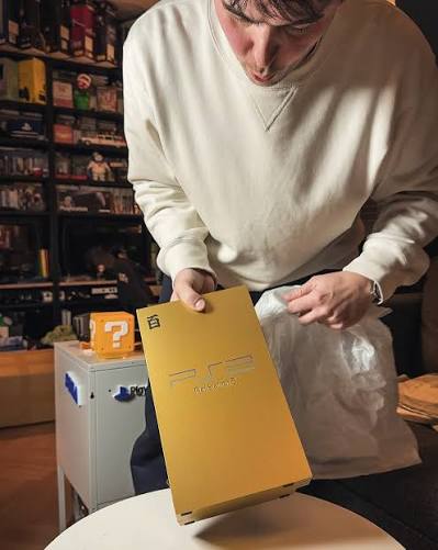 Collection of rare limited-edition PlayStation 2 consoles including Ocean Blue and special edition PS2 bundles displayed for collectors.