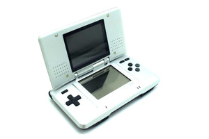 Classic Nintendo DS gaming setup with authentic games