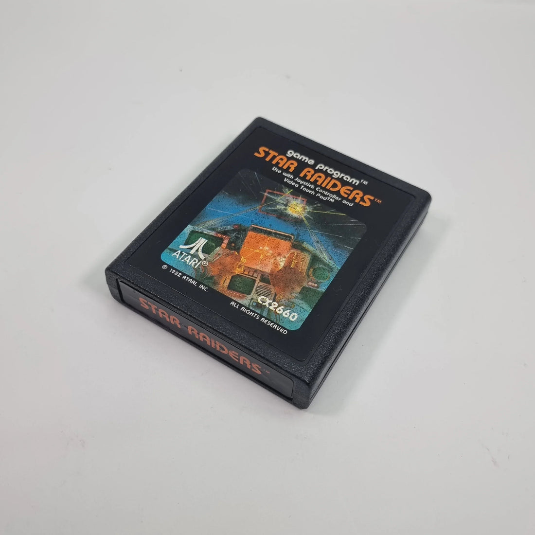 Original retro game cartridges, CDs and DVDs comparing the lifespan of physical video games and long-term game preservation