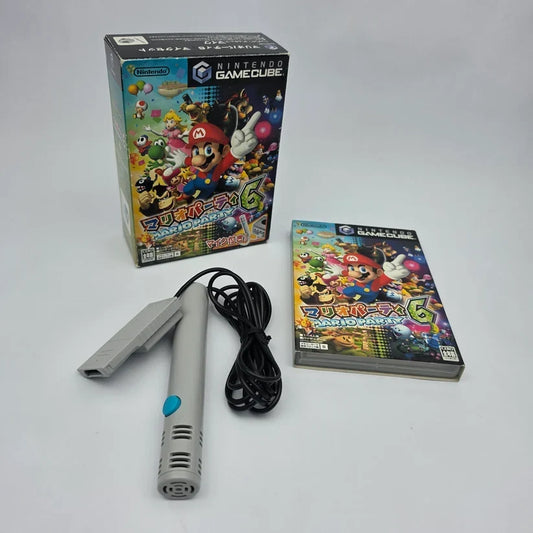 Japanese NTSC-J retro games beside Nintendo, PlayStation and Sega consoles illustrating video game region locking and compatibility.