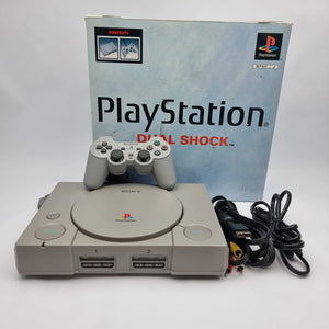 Retro gaming collection in the UAE featuring classic PlayStation, Nintendo and SEGA consoles with original physical games.