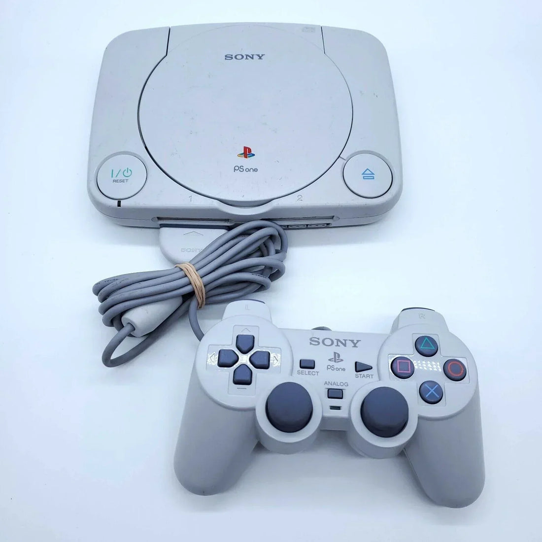 Original Sony PlayStation 1 console with classic PS1 games and accessories for retro gaming collectors in the UAE