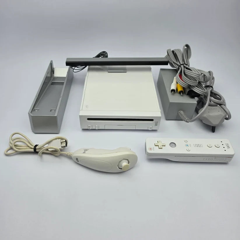 Original white Nintendo Wii console with Wii Remote and accessories for retro gaming collectors in Dubai UAE