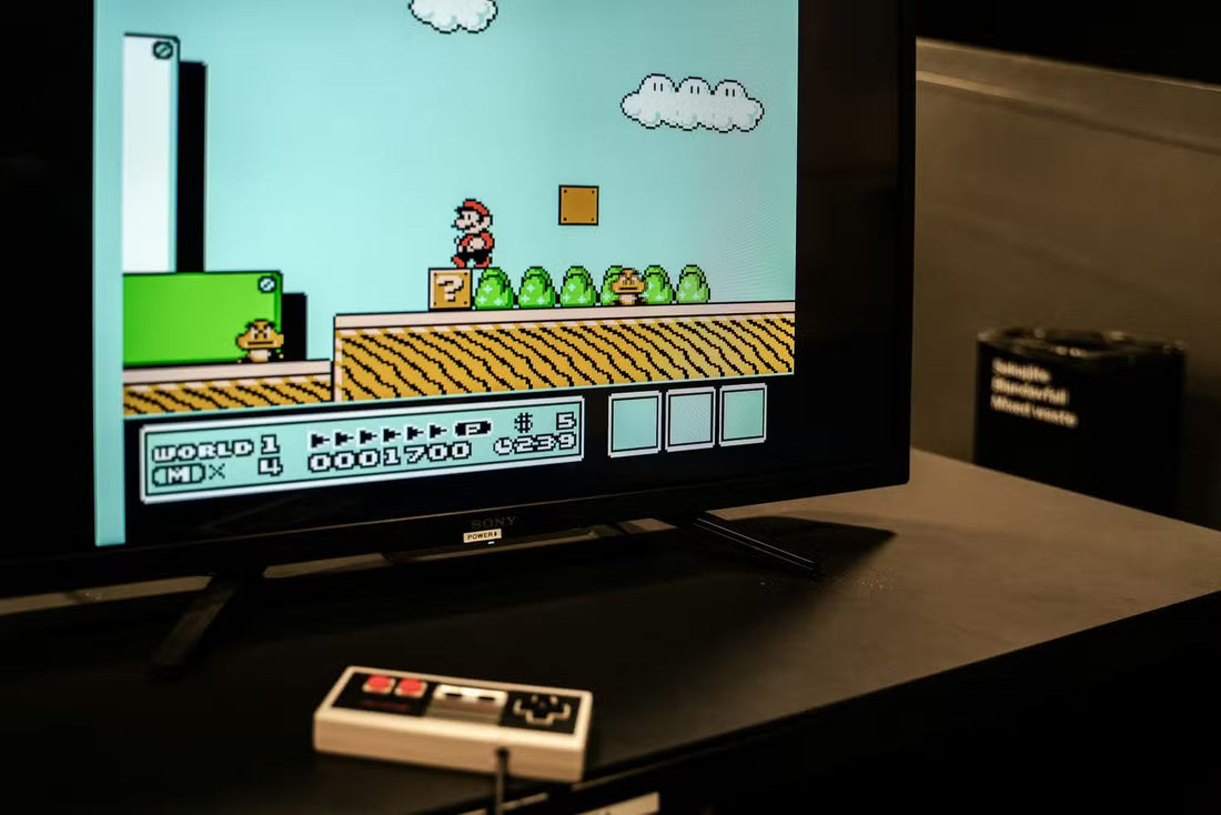 Classic CRT television displaying a retro video game alongside original Nintendo, PlayStation and Sega consoles for an authentic retro gaming setup.