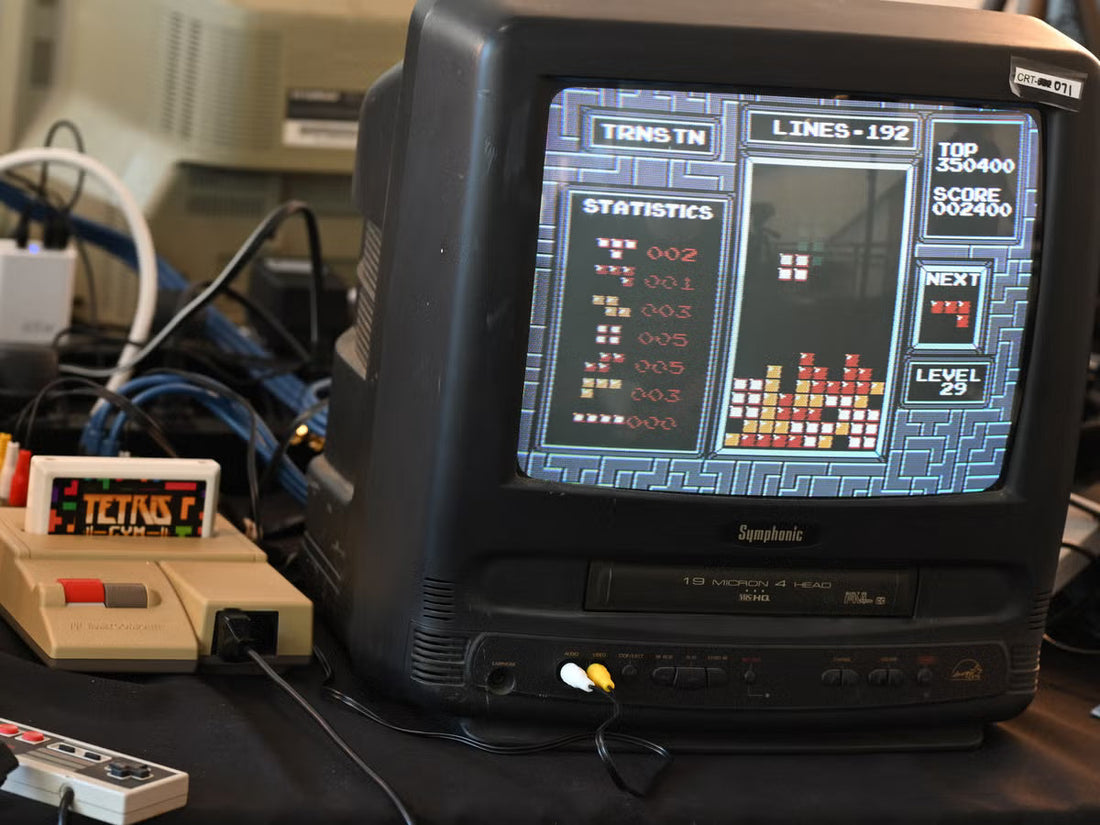 Original retro gaming consoles, physical games, and classic controllers set up for an authentic vintage gaming experience.