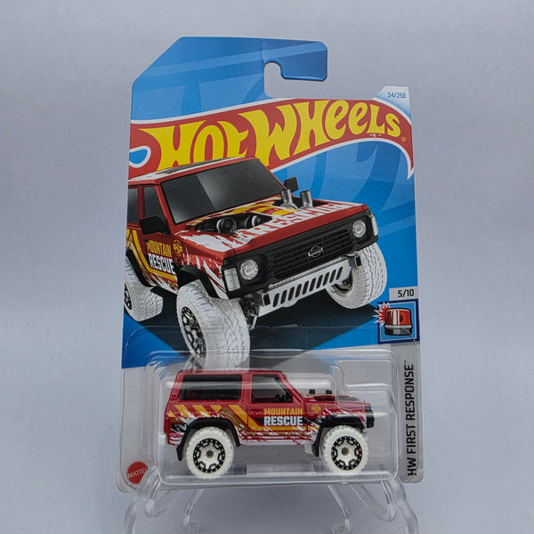 HotWheels - Nissan Patrol Custom (Red)